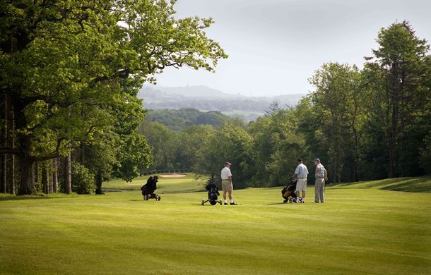 Golfers chatting on the Wales National Course
