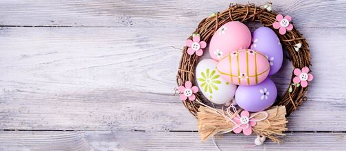 Decorative Easter eggs in wreath 